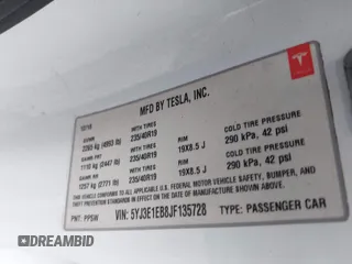 2018 Tesla Model 3 Long Range Battery z VIN 5YJ3E1EB8JF135728, wystawiony jako IAAI lot #41863870 z przebiegiem 124 053 mil mil oraz . Historia ofert i sprzedaży dostępna na DreamBid. Obrazek 9.