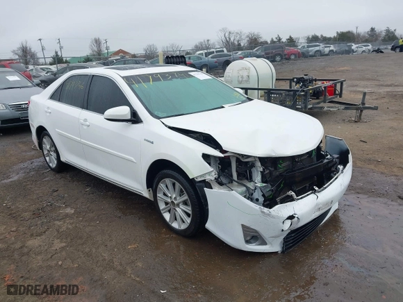 2014 Toyota Camry Hybrid LE with VIN 4T1BD1FK1EU102768, listed as a IAAI auction lot 41793746 with 157,015 mi miles. Bid and sale history available at carsss.com. Image 1.