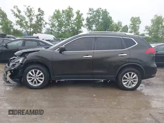 2017 Nissan Rogue SV with VIN KNMAT2MV1HP601384, listed as a IAAI auction lot 42454707 with 159,501 mi miles and . Bid and sale history available at DreamBid. Image 14.