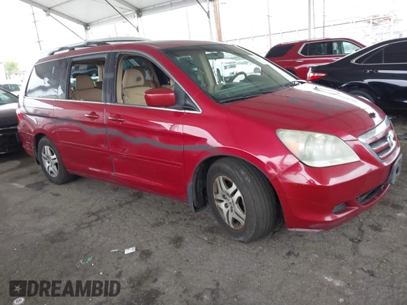 2005 Honda Odyssey EX with VIN 5FNRL38485B411954, listed as a IAAI auction lot 42039034 with 220,966 mi miles. Bid and sale history available at carsss.com. Image 1.