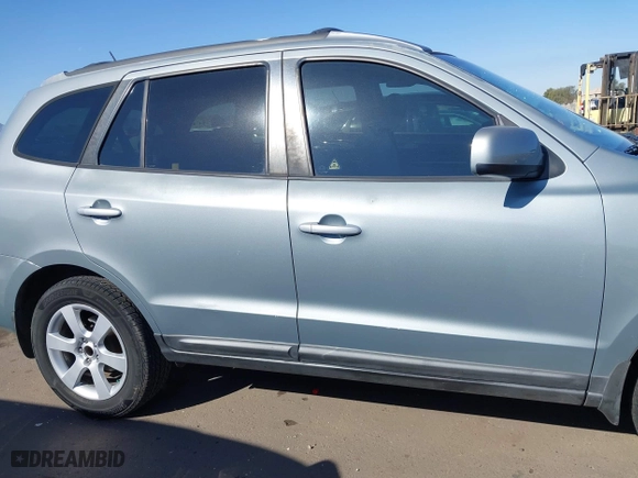 2009 Hyundai Santa Fe SE with VIN 5NMSH13E29H313319, listed as a IAAI auction lot 41857145 with 149,692 mi miles. Bid and sale history available at carsss.com. Image 14.