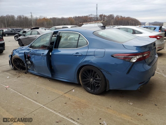 2023 Toyota Camry XSE with VIN 4T1K61BKXPU106241, listed as a Copart auction lot 82696114 with 22,079 mi miles and Salvage Title. Bid and sale history available at carsss.com. Image 2.