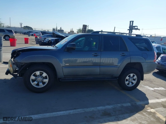 2003 Toyota 4Runner SR5 with VIN JTEZU14R238001341, listed as a IAAI auction lot 41670928 with 212,723 mi miles. Bid and sale history available at carsss.com. Image 15.