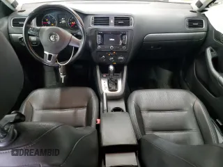 2014 Volkswagen Jetta TDI w/Premium with VIN 3VWLL7AJ9EM261908, listed as a Copart auction lot 60703205 with 128,892 mi miles and Salvage title. Bid and sale history available at DreamBid. Image 8.