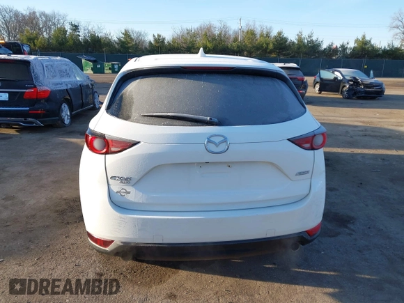 2017 Mazda CX-5 Touring with VIN JM3KFBCL8H0136601, listed as a IAAI auction lot 41830355 with 113,677 mi miles. Bid and sale history available at carsss.com. Image 17.