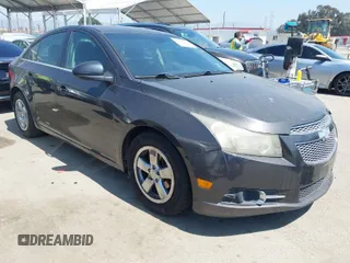2014 Chevrolet Cruze 1LT with VIN 1G1PC5SB4E7117931, listed as a IAAI auction lot 41997100 with 150,910 mi miles and . Bid and sale history available at DreamBid. Image 1.