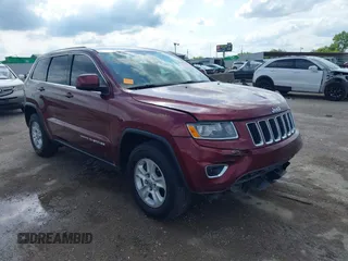 2016 Jeep Grand Cherokee Laredo z VIN 1C4RJEAG2GC386636, wystawiony jako IAAI lot #42347946 z przebiegiem 325 943 mil mil oraz . Historia ofert i sprzedaży dostępna na DreamBid. Obrazek 1.
