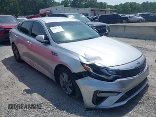 2020 Kia Optima LX with VIN 5XXGT4L3XLG429961, listed as a IAAI auction lot 42483950 with 97,677 mi miles and . Bid and sale history available at DreamBid. Image 1.