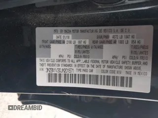 2018 Mazda 3 Touring with VIN 3MZBN1V30JM201671, listed as a IAAI auction lot 42189105 with 174,284 mi miles and . Bid and sale history available at carsss.com. Image 9.