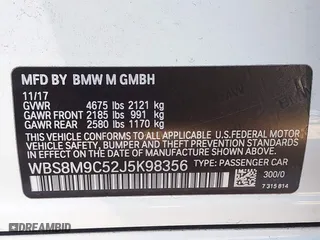 2018 BMW M3 with VIN WBS8M9C52J5K98356, listed as a IAAI auction lot 41593546 with 91,478 mi miles. Bid and sale history available at carsss.com. Image 9.
