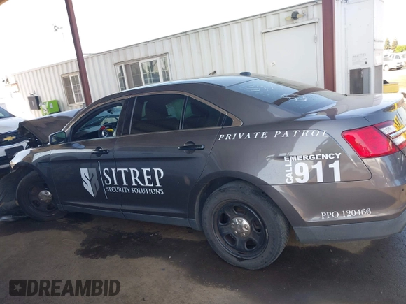 2015 Ford Police Interceptor z VIN 1FAHP2MK6FG175977, wystawiony jako IAAI lot #41992411 z przebiegiem 157 029 mil mil oraz . Historia ofert i sprzedaży dostępna na DreamBid. Obrazek 15.