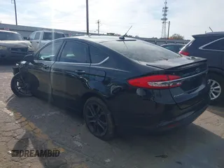2018 Ford Fusion SE with VIN 3FA6P0HDXJR157605, listed as a IAAI auction lot 40979897 with 128,322 mi miles. Bid and sale history available at carsss.com. Image 3.