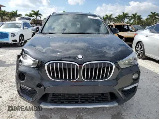 2019 BMW X1 xDrive28i with VIN WBXHT3C55K5L90055, listed as a Copart auction lot 47262905 with 88,442 mi miles and Salvage Title. Bid and sale history available at carsss.com. Image 5.