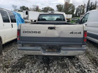 1999 Dodge Ram 2500 with VIN 1B7KF2363XJ519664, listed as a Copart auction lot 79477244 with 415,712 mi miles and Salvage Title. Bid and sale history available at carsss.com. Image 6.