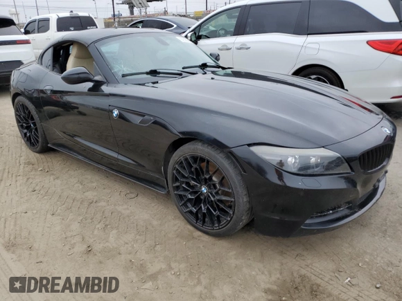 2012 BMW Z4 sDrive28i with VIN WBALL5C56CE716558, listed as a Copart auction lot 62003125 with 93,438 mi miles and Salvage title. Bid and sale history available at DreamBid. Image 4.