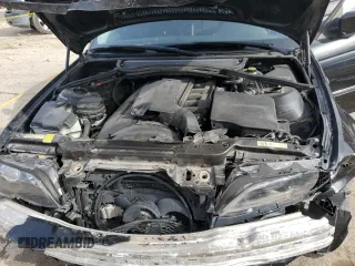 2003 BMW 3 Series 325xi with VIN WBAEU334X3PM56980, listed as a Copart auction lot 51082745 with 159,044 mi miles and Salvage Title. Bid and sale history available at carsss.com. Image 12.