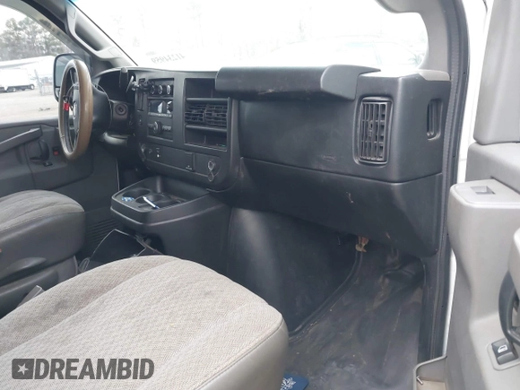 2017 Chevrolet Express Cargo Van with VIN 1GCWGBFG4H1348685, listed as a IAAI auction lot 41234959 with 215,067 mi miles. Bid and sale history available at carsss.com. Image 5.