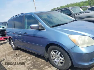 2006 Honda Odyssey EX z VIN 5FNRL38476B120251, wystawiony jako IAAI lot #42128586 z przebiegiem 171 372 mil mil oraz . Historia ofert i sprzedaży dostępna na DreamBid. Obrazek 13.