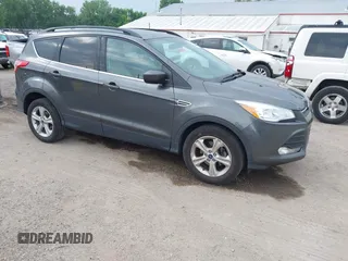 2016 Ford Escape SE z VIN 1FMCU0GX9GUC56396, wystawiony jako IAAI lot #42492362 z przebiegiem 150 675 mil mil oraz . Historia ofert i sprzedaży dostępna na DreamBid. Obrazek 1.