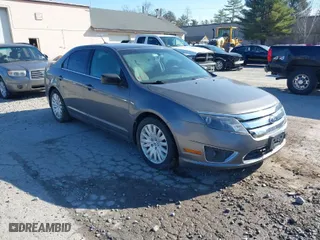 2011 Ford Fusion Hybrid with VIN 3FADP0L36BR114063, listed as a IAAI auction lot 42013961 with 141,255 mi miles. Bid and sale history available at carsss.com. Image 1.
