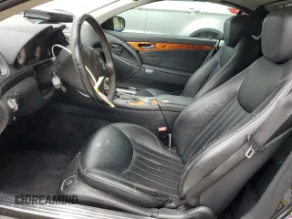 2009 Mercedes-Benz SL 550 with VIN WDBSK71F09F143389, listed as a Copart auction lot 49651665 with 110,204 mi miles and Salvage title. Bid and sale history available at DreamBid. Image 7.