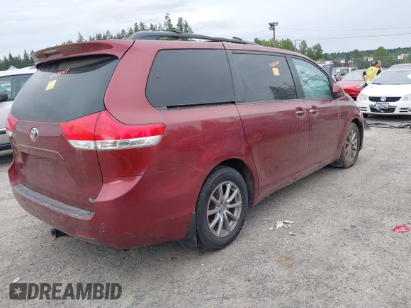 2011 Toyota Sienna XLE AAS with VIN 5TDYK3DC0BS093590, listed as a IAAI auction lot 42714201 with 155,699 mi miles and . Bid and sale history available at DreamBid. Image 4.