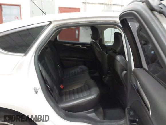 2016 Ford Fusion SE с VIN 3FA6P0H90GR194232, выставлен на аукционе IAAI как лот 42452759 с пробегом 99 310 миль миль и . История ставок и продаж доступна на DreamBid. Изображение 8.