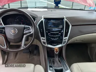 2015 Cadillac SRX Luxury Collection z VIN 3GYFNBE37FS569840, wystawiony jako Copart lot #52823025 z przebiegiem 183 816 mil mil oraz Czysty tytuł • Clean title. Historia ofert i sprzedaży dostępna na DreamBid. Obrazek 9.