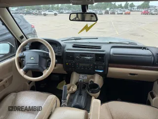 2003 Land Rover Discovery SE z VIN SALTW16443A810170, wystawiony jako Copart lot #61057015 z przebiegiem 149 678 mil mil oraz Czysty tytuł • Clean title. Historia ofert i sprzedaży dostępna na DreamBid. Obrazek 9.
