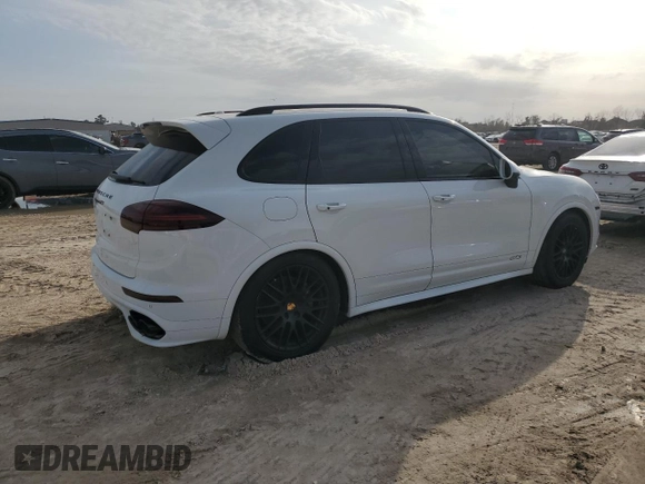 2017 Porsche Cayenne GTS with VIN WP1AD2A29HLA83277, listed as a Copart auction lot 88704975 with 47,838 mi miles and Salvage title. Bid and sale history available at DreamBid. Image 3.