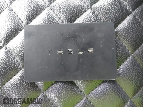 2020 Tesla Model Y Long Range with VIN 5YJYGDEF0LF000380, listed as a IAAI auction lot 41867489 with 66,294 mi miles and . Bid and sale history available at DreamBid. Image 11.