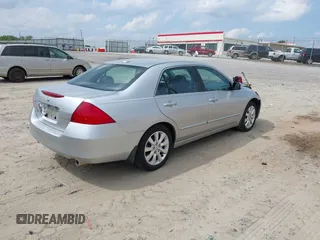 2006 Honda Accord EX-L z VIN 1HGCM66536A063170, wystawiony jako IAAI lot #42289365 z przebiegiem 110 317 mil mil oraz . Historia ofert i sprzedaży dostępna na DreamBid. Obrazek 4.