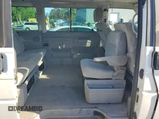 2003 Volkswagen EuroVan MV с VIN WV2MB47053H012029, выставлен на аукционе Copart как лот 68222234 с пробегом 247 494 миль миль и Списание • Salvage title. История ставок и продаж доступна на DreamBid. Изображение 11.
