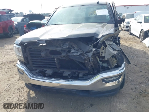 2017 GMC Sierra 1500 SLE z VIN 1GTV2MEC1HZ140821, wystawiony jako IAAI lot #41838298 z przebiegiem 98 229 mil mil oraz . Historia ofert i sprzedaży dostępna na DreamBid. Obrazek 13.