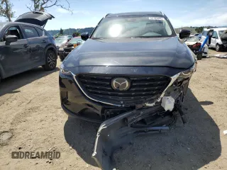 2022 Mazda CX-9 Touring Plus with VIN JM3TCBAY6N0613050, listed as a Copart auction lot 54103465 with 44,349 mi miles and Salvage title. Bid and sale history available at DreamBid. Image 5.