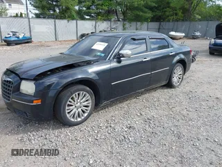 2006 Chrysler 300 Touring with VIN 2C3KA53G36H220558, listed as a IAAI auction lot 42159373 with 158,970 mi miles. Bid and sale history available at carsss.com. Image 2.