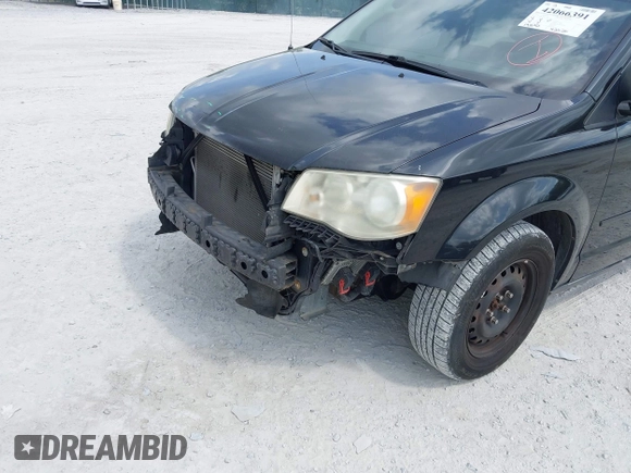 2012 Dodge Grand Caravan SE with VIN 2C4RDGBG9CR251169, listed as a IAAI auction lot 42066391 with 193,912 mi miles and . Bid and sale history available at DreamBid. Image 6.
