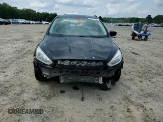 2018 Ford Focus SE z VIN 1FADP3F28JL319269, wystawiony jako Copart lot #59604555 z przebiegiem 167 726 mil mil oraz Szkoda całkowita • Salvage title. Historia ofert i sprzedaży dostępna na DreamBid. Obrazek 13.