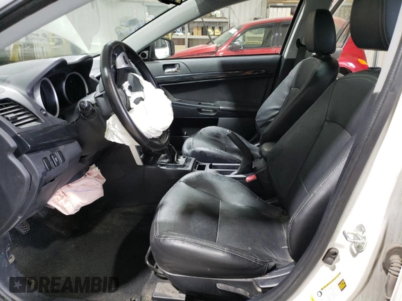 2016 Mitsubishi Lancer GT with VIN JA32U8FW9GU011121, listed as a Copart auction lot 82325464 with 101,202 mi miles and Salvage Title. Bid and sale history available at carsss.com. Image 7.