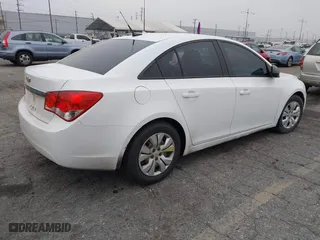 2014 Chevrolet Cruze LS with VIN 1G1PB5SG9E7168906, listed as a IAAI auction lot 42040703 with 217,199 mi miles. Bid and sale history available at carsss.com. Image 4.