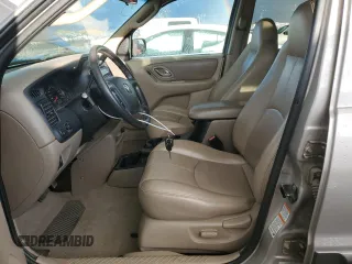 2001 Mazda Tribute LX with VIN 4F2CU08141KM64641, listed as a Copart auction lot 78269324 with 175,438 mi miles and Salvage Title. Bid and sale history available at DreamBid. Image 7.