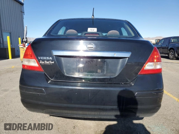 2010 Nissan Versa 1.8 S with VIN 3N1BC1AP2AL376000, listed as a Copart auction lot 41435585 with 215,017 mi miles and Salvage Title. Bid and sale history available at carsss.com. Image 6.