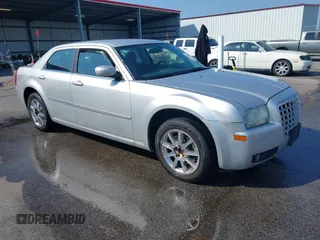 2008 Chrysler 300 Touring with VIN 2C3LK53G38H233492, listed as a IAAI auction lot 42004537 with 200,695 mi miles and . Bid and sale history available at carsss.com. Image 1.