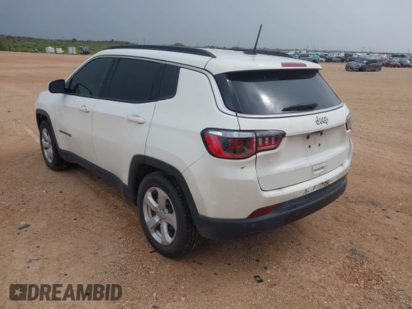 2019 Jeep Compass Latitude with VIN 3C4NJCBB3KT802907, listed as a IAAI auction lot 42595157 with 103,993 mi miles and . Bid and sale history available at DreamBid. Image 3.