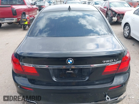 2013 BMW 7 Series 750Li with VIN WBAYE8C55DD133178, listed as a IAAI auction lot 41509860 with 90,841 mi miles and . Bid and sale history available at DreamBid. Image 16.