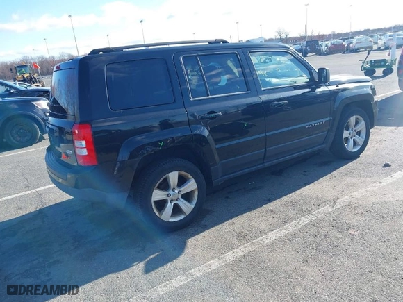 2014 Jeep Patriot Latitude with VIN 1C4NJRFB0ED661625, listed as a IAAI auction lot 41856277 with 62,781 mi miles. Bid and sale history available at carsss.com. Image 4.
