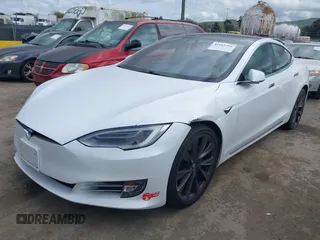 2018 Tesla Model S 75D with VIN 5YJSA1E23JF271465, listed as a IAAI auction lot 41911356 with 50,483 mi miles and . Bid and sale history available at DreamBid. Image 20.