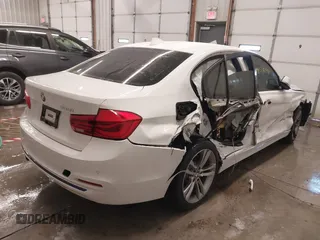 2016 BMW 3 Series 328i with VIN WBA8E9G5XGNT85247, listed as a IAAI auction lot 41578238 with 64,951 mi miles. Bid and sale history available at carsss.com. Image 4.