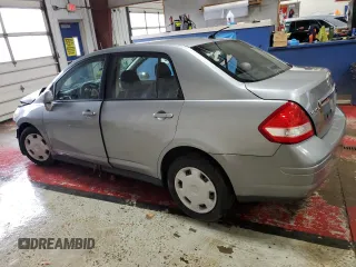 2009 Nissan Versa S with VIN 3N1BC11E29L445486, listed as a Copart auction lot 51532695 with Not Provided miles and Salvage Title. Bid and sale history available at DreamBid. Image 2.