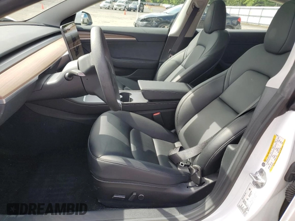 2023 Tesla Model 3 Long Range with VIN 5YJ3E1EB1PF603100, listed as a Copart auction lot 54945865 with 22,865 mi miles and Salvage Title. Bid and sale history available at DreamBid. Image 7.